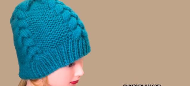 The doll wears a blue-colored Unisex Chunky Cable Beanie on its head.